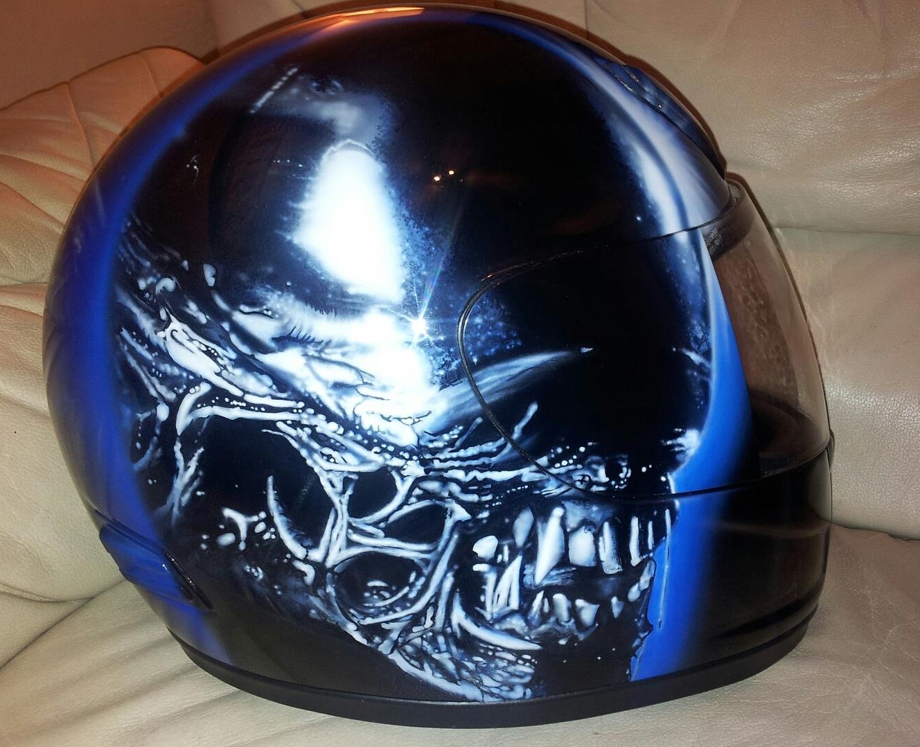 Airbrushed Painting of Alien vs Predator Helmet design with Alien on one side and Predator on the other